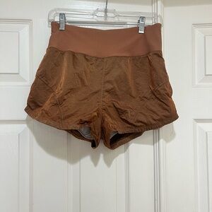 Free people movement Burnt Orange 80s style High waisted shorts‎ size XS